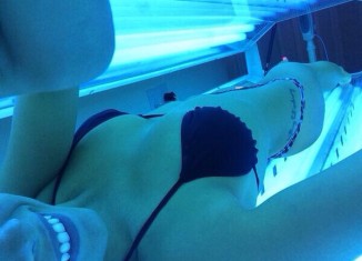 Girl in Tanning Bed