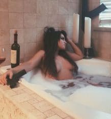 Girl Topless in Bath Tub