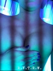 Girl in Tanning Bed Hand Bra
